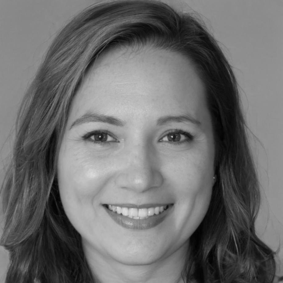 Financial education expert Cressida Holloway reviewing student analysis work